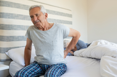 Senior men suffering from back pain