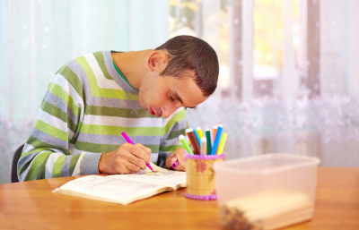 young man engages in self study