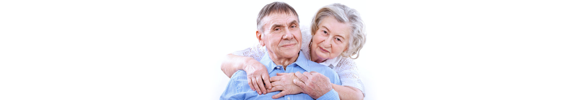 Closeup portrait of smiling elderly couple