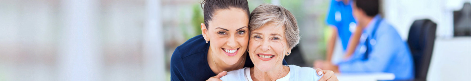 nurse and senior woman smiling