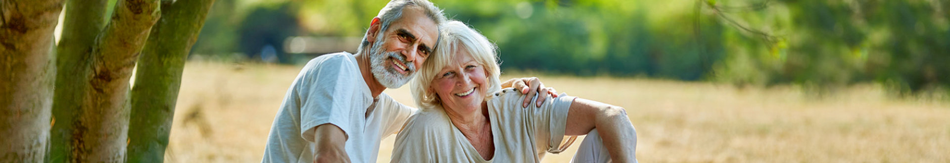 Senior couple taking a break from hiking